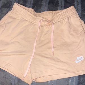 Pink NIKE shorts. Worn gently